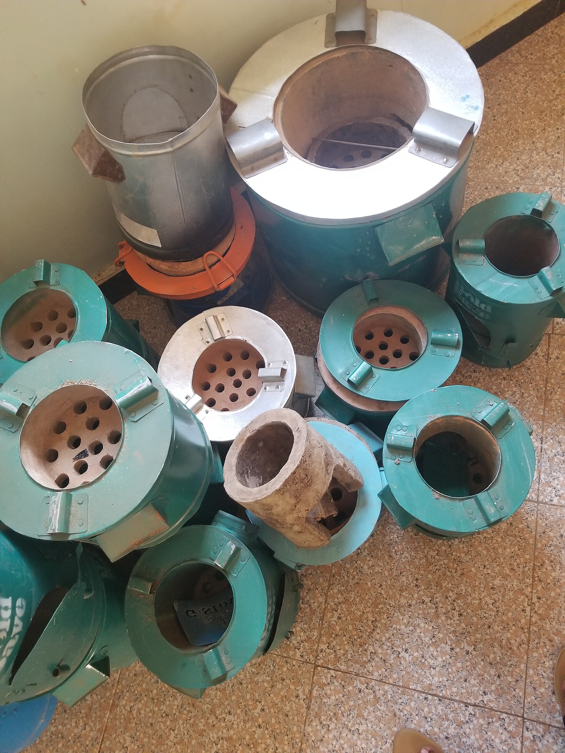 A set of improved metal cookstoves used in clean-cooking programmes